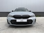 BMW 3-Serie Touring 320e M Sport | SOH 97% | Panorama | Trekhaak | Apple Carplay - Android Auto | Sfeerverlichting | Brooklyn Grau
