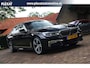 BMW 7-Serie 730d High Executive Aut. | M-pakket | Schuif/kanteldak | Achterasbesturing | H&K | Massage | Lederenpanelen | Adaptief