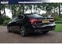 BMW 7-Serie 730d High Executive Aut. | M-pakket | Schuif/kanteldak | Achterasbesturing | H&K | Massage | Lederenpanelen | Adaptief