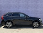 Volvo XC60 2.0 T6 Plug-in hybrid AWD Essential | Gratis Trekhaak | Stoel/stuurverwarming | adaptieve cruise | BLIS | 19" velgen | Nordico interieur | Extra getint glas | Zwarte hemel bekleding | All Season Banden |