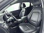 Hyundai Kona Electric EV PREMIUM 64 kWh | SoH 95,4% | 3- FASE | NAVI | CLIMA | ADAPT. CRUISE | CAMERA | HUD | LEDER | STUUR- & STOELVERWARMING | WARMTEPOMP | PRIVACY GLASS | WLTP 481 KM! |