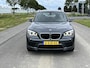 BMW X1 sDrive20i High Executive Clima, cruise, stoelverwarming, pdc, trekhaak
