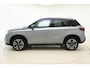 Suzuki Vitara 1.4 Boosterjet Style Smart Hybrid 129pk | Panoramadak | Trekhaak | Climate Control | Cruise Control Adaptief | Camera | Stoelverwarming | Navigatie | Parkeersensoren
