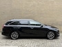 Kia Ceed Sportswagon 1.6 GDI PHEV ExecutiveLine | Facelift | Lederen bekleding | Adaptieve cruise | Navigatie | Camera | Stoelverwarming voor&achter | Stoelkoeling | Apple CarPlay | LED | DAB | Keyless entry&start | 17 inch velgen | Dodehoekdectectie | Elektrische achterklep | Volledig dealeronderhouden