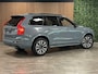 Volvo XC90 T8 AWD Recharge Ultimate Dark Long Range | Trekhaak | 360 Camera | Head-Up Display | Harman Kardon | 455pk | All Season banden | Adaptieve Cruise Control | Stoelverwarming voor+achter | Stuurwielverwarming | Schuifdak | Standkachel met Volvo On Call App | Full LED Meesturende koplampen | Pilot Assist | BLIS Dode Hoek Detectie | Alcantara hemelbekleding | Lederen zonnekleppen en handgrepen | Elektrische voorstoelen geheugen | R-Design Contour stoelen met wit stiksel en bies | Zitting verlenging voorstoelen | Lederen dashboard | 20 Inch | Google Infotainment | Keyless Drive | Privacy Glass | Elektrisch bedienbare achterklep | Geïntegreerd kinderzitje achterin | Geïntegreerde zongordijnen achterportieren | Verlichte instaplijsten | 7-Persoons | 4-Zone Climate Control | DAB Radio | Apple Carplay/Android Auto | Thunder Grey Metallic |
