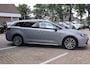 Toyota Corolla Touring Sports 1.8 HYBRID DYNAMIC KEYLESS STOELVERW. DRAADLOZE TEL. LADER ALL-SEASON PAS.STOEL IN HOOGTE VERSTELBAAR APPLE/ANDROID