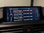 BMW 1-Serie 116i Business+ (PANO, LEER, LED, CRUISE, H&K AUDIO, PARKEERSENSOREN)