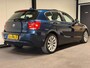 BMW 1-Serie 116i Business+ (PANO, LEER, LED, CRUISE, H&K AUDIO, PARKEERSENSOREN)