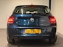 BMW 1-Serie 116i Business+ (PANO, LEER, LED, CRUISE, H&K AUDIO, PARKEERSENSOREN)