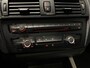 BMW 1-Serie 116i Business+ (PANO, LEER, LED, CRUISE, H&K AUDIO, PARKEERSENSOREN)
