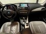 BMW 1-Serie 116i Business+ (PANO, LEER, LED, CRUISE, H&K AUDIO, PARKEERSENSOREN)