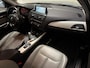 BMW 1-Serie 116i Business+ (PANO, LEER, LED, CRUISE, H&K AUDIO, PARKEERSENSOREN)