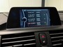 BMW 1-Serie 116i Business+ (PANO, LED, STOELVERWARMING, NAVI, TREKHAAK, HALF LEDER)
