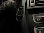 BMW 1-Serie 116i Business+ (PANO, LED, STOELVERWARMING, NAVI, TREKHAAK, HALF LEDER)