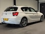 BMW 1-Serie 116i Business+ (PANO, LED, STOELVERWARMING, NAVI, TREKHAAK, HALF LEDER)