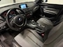 BMW 1-Serie 116i Business+ (PANO, LED, STOELVERWARMING, NAVI, TREKHAAK, HALF LEDER)