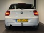 BMW 1-Serie 116i Business+ (PANO, LED, STOELVERWARMING, NAVI, TREKHAAK, HALF LEDER)