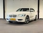 BMW 1-Serie 116i Business+ (PANO, LED, STOELVERWARMING, NAVI, TREKHAAK, HALF LEDER)