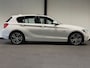 BMW 1-Serie 116i Business+ (PANO, LED, STOELVERWARMING, NAVI, TREKHAAK, HALF LEDER)