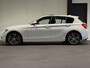 BMW 1-Serie 116i Business+ (PANO, LED, STOELVERWARMING, NAVI, TREKHAAK, HALF LEDER)