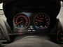 BMW 1-Serie 116i Business+ (PANO, LED, STOELVERWARMING, NAVI, TREKHAAK, HALF LEDER)
