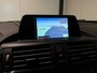 BMW 1-Serie 116i Business+ (PANO, LED, STOELVERWARMING, NAVI, TREKHAAK, HALF LEDER)
