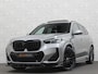 BMW X1 18i M-Sport Performance-Pack | Panorama | Sportstoelen | Carbon | Keyless-Entry | Sfeerverlichting | Achteruitrij-Camera | 5x op voorraad | Carplay | Full-LED | Black-Optic | Getint Glas | Stoelverwarming | Draadloos Laden |