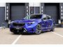 BMW M5 5-Serie Touring (g61) 728pk xDrive | Marina Bay Blue | Bowers & Wilkins | Carbon | Trekhaak | M Drive Prof |
