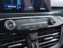 Ford Kuga 1.5T 150PK ST-Line Trekhaak Adap.Cruise Elek.Achterklep Camera Apple Carplay/Android Navi Stoel+Stuur+Achterbank+Voorruitverwarming Pdc Lmv 18" DAB Bluetooth Parkeerhulp Led Lane Assist Isofix Road Edge Detection WiFi 1.800KG Trekgewicht
