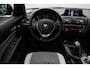 BMW 1-Serie 116i Business+ 2012 | Navigatie | Cruise Control | Stoel Verwarming | Parkeersensoren | Lichtmetalen Velgen | 2 Sleutels | Boekjes | Stuurwiel Bediening | Regensensor