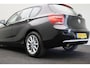 BMW 1-Serie 116i Business+ 2012 | Navigatie | Cruise Control | Stoel Verwarming | Parkeersensoren | Lichtmetalen Velgen | 2 Sleutels | Boekjes | Stuurwiel Bediening | Regensensor