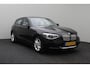BMW 1-Serie 116i Business+ 2012 | Navigatie | Cruise Control | Stoel Verwarming | Parkeersensoren | Lichtmetalen Velgen | 2 Sleutels | Boekjes | Stuurwiel Bediening | Regensensor