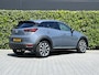 Mazda CX-3 2.0 SkyActiv-G 121 LUXURY, NAVIGATIE, CRUISE CONTROL, CLIMATE CONTROL, STOELVERWARMING, HALF LEDER, DODEHOEK, KEYLESS, HUD, LED, DAB, LICHTMETAAL 18"