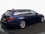 BMW 5-Serie Touring 528xi Executive blauw