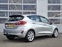 Ford Fiesta 1.0 EcoBoost Titanium | Trekhaak | Adaptieve Cruise Control | 16'' LMV | Voorruitverwarming | Achteruitcamera | Climate Control | B&O Premium Sound | Parkeersensoren V+A |