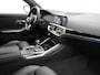 BMW 3-Serie Touring 330e Sportline PHEV 293pk Dealer O.H. | Dravitgrau | Trekhaak Af Fabriek | Adaptive Cruise | Laser LED | Head Up | Adaptief Onderstel | Camera | Sportstoelen Verwarmd | Sfeerverlichting | Keyless | Blis | Apple Carplay | 19"L.M | Plug In Hybrid |