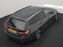 BMW 3-Serie Touring 330e Sportline PHEV 293pk Dealer O.H. | Dravitgrau | Trekhaak Af Fabriek | Adaptive Cruise | Laser LED | Head Up | Adaptief Onderstel | Camera | Sportstoelen Verwarmd | Sfeerverlichting | Keyless | Blis | Apple Carplay | 19"L.M | Plug In Hybrid |