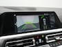 BMW 3-Serie Touring 330e Sportline PHEV 293pk Dealer O.H. | Dravitgrau | Trekhaak Af Fabriek | Adaptive Cruise | Laser LED | Head Up | Adaptief Onderstel | Camera | Sportstoelen Verwarmd | Sfeerverlichting | Keyless | Blis | Apple Carplay | 19"L.M | Plug In Hybrid |