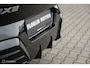 BMW IX2 eDrive20 67 kWh | M-Sport | Camera | Pano | Donkere hemel | Stoel en stuurwielverw. | Draadloos telefoon laden | CarPlay | 19 Inch | DAB+