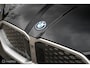BMW IX2 eDrive20 67 kWh | M-Sport | Camera | Pano | Donkere hemel | Stoel en stuurwielverw. | Draadloos telefoon laden | CarPlay | 19 Inch | DAB+