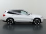 BMW iX3 Executive 80 kWh | SOH 94% | Panoramadak | Sportstoelen | Lederen Interieur | Ele. verstelbare stoelen + Geheugen | 360 Camera | DAB | Apple CarPlay/Android Auto | Stoelverwarming | Adaptieve Cruise Control | HUD | Ele. kofferdeksel |