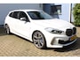 BMW 1-Serie M135i xDrive High Executive | Incl. 12 maanden Garantie | Akrapovič uitlaatsysteem | Dealer onderhouden | Stoelverwarming | Cruise controle | Apple CarPlay/Android Auto | Keyless start | Schakelflippers | Climate controle | Navigatie | Parkeersensoren V+A | Half lederen bekleding |