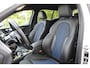 BMW 1-Serie M135i xDrive High Executive | Incl. 12 maanden Garantie | Akrapovič uitlaatsysteem | Dealer onderhouden | Stoelverwarming | Cruise controle | Apple CarPlay/Android Auto | Keyless start | Schakelflippers | Climate controle | Navigatie | Parkeersensoren V+A | Half lederen bekleding |