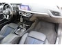 BMW 1-Serie M135i xDrive High Executive | Incl. 12 maanden Garantie | Akrapovič uitlaatsysteem | Dealer onderhouden | Stoelverwarming | Cruise controle | Apple CarPlay/Android Auto | Keyless start | Schakelflippers | Climate controle | Navigatie | Parkeersensoren V+A | Half lederen bekleding |