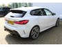 BMW 1-Serie M135i xDrive High Executive | Incl. 12 maanden Garantie | Akrapovič uitlaatsysteem | Dealer onderhouden | Stoelverwarming | Cruise controle | Apple CarPlay/Android Auto | Keyless start | Schakelflippers | Climate controle | Navigatie | Parkeersensoren V+A | Half lederen bekleding |