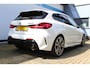 BMW 1-Serie M135i xDrive High Executive | Incl. 12 maanden Garantie | Akrapovič uitlaatsysteem | Dealer onderhouden | Stoelverwarming | Cruise controle | Apple CarPlay/Android Auto | Keyless start | Schakelflippers | Climate controle | Navigatie | Parkeersensoren V+A | Half lederen bekleding |