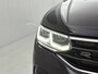 Volkswagen Tiguan 1.5 TSI R-Line Business+ 150 PK | Automaat | Climate Control | Apple Carplay & Android Auto | Stoelverwarming | Stuurverwarming | Adaptive Cruise Control | Lane Assist | Achteruitrijcamera | Parkeersensoren | Panoramadak |