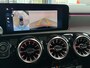 Mercedes-Benz A-klasse 180 Business Solution AMG | Panoramaschuifdak | Night | Premium Plus pakket | Dodehoekassistent | Head-up display | 19-inch Zwarte AMG Velgen |