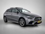 Mercedes-Benz B-klasse 250 e Business Solution AMG | AMG Line | Panoramadak | Parkeerpakket met achteruitrijcamera | Sfeerverlichting | EASY PACK achterklep | MultiBeam Ledkoplampen. Inclusief 24 maanden MB Certified garantie voor Europa.