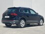 Volkswagen Tiguan 1.4 TSI eHybrid Elegance Business+ / Dealer onderhouden / Elektrische trekhaak (1800 kg) / Accu SoH 94.4 % / Navigatie / Apple Carplay Android / Stuur- en stoelverwarming / Parkeer assistent / 18" LM wielen /